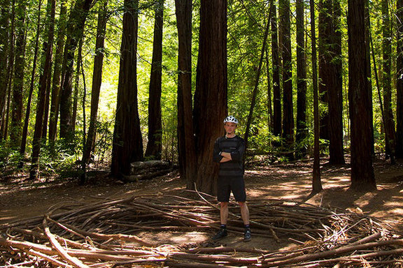On-foot shot of Marco Black casual cycling shoes on a trail, showing clipless MTB shoe design for mountain bike rides

