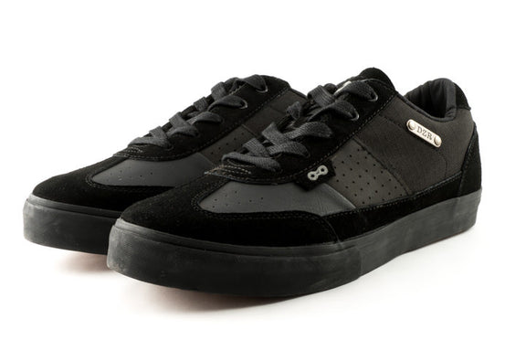 Front side view of black Minna clipless cycling shoes with full-grain leather and casual style