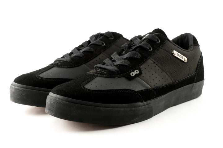 Front side view of black Minna clipless cycling shoes with full-grain leather and casual style
