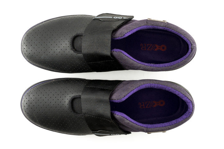 Top view of purple clipless mtb shoes showing vegan upper and Variable Flex Shank technology
