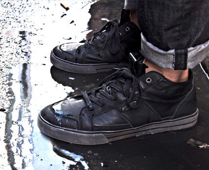 On-foot action view of H2O waterproof cycling shoes highlighting waterproof style