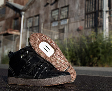 Marco Black clipless mtb shoe isolated angle highlighting durable construction and power plate for efficient pedaling